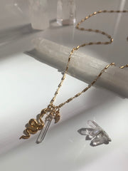 she charms snakes necklace